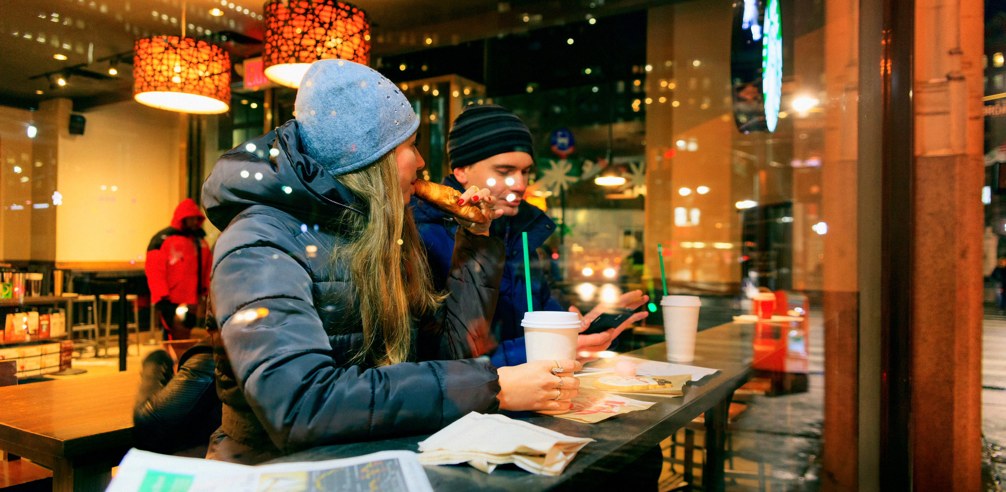 Man and women in the Starbucks cafe